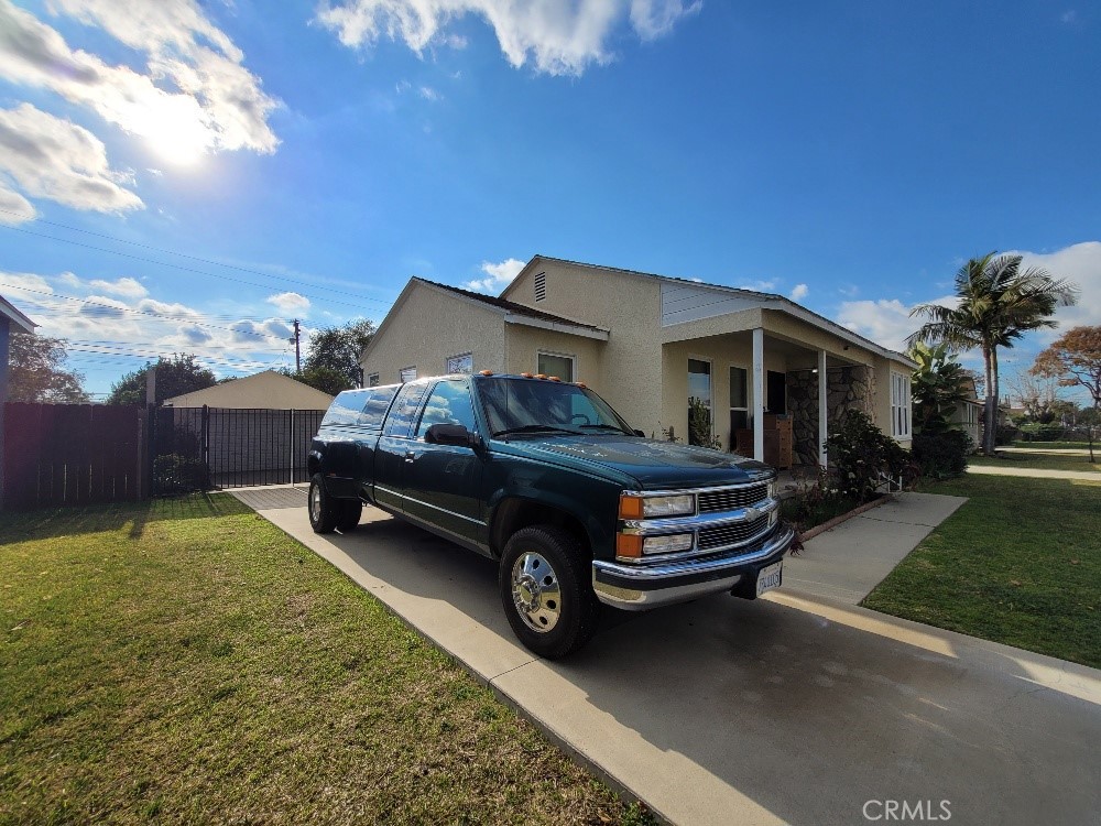14030 Dittmar Drive Whittier, CA 90605 - Photo 3 of 32 a car parked in front of a house