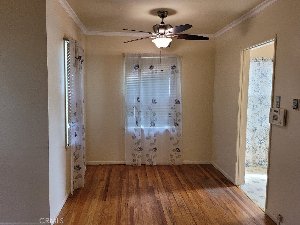 14030 Dittmar Drive Whittier, CA 90605 - Photo 5 of 32 wooden floor in an empty room with a window