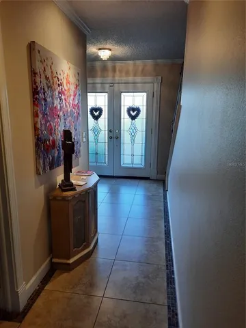 a view of a hallway and a stove in a gallery
