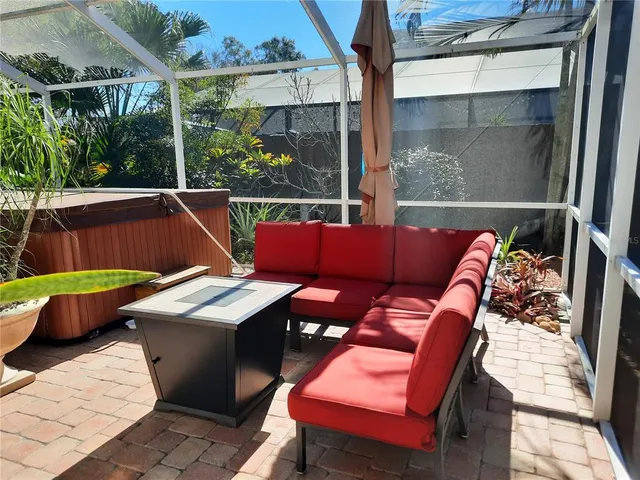 a outdoor living space with furniture and a potted plant