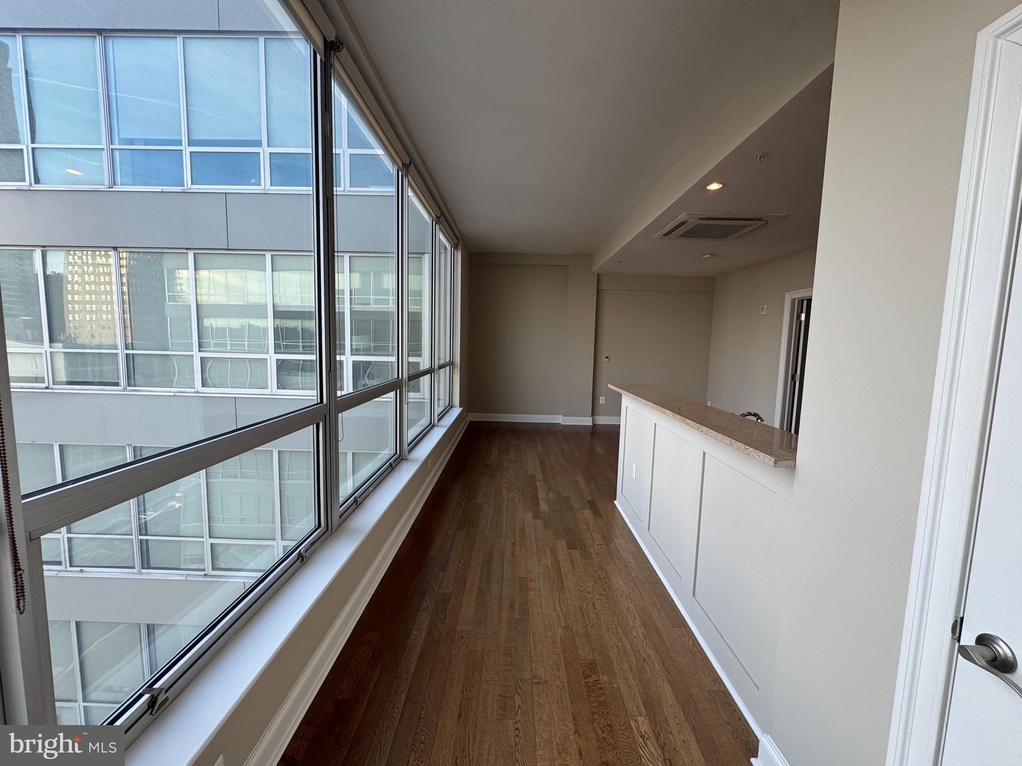 2040 Market Street, Unit 615 Philadelphia, PA 19103 - Photo 2 of 12 a view of a balcony with wooden floor