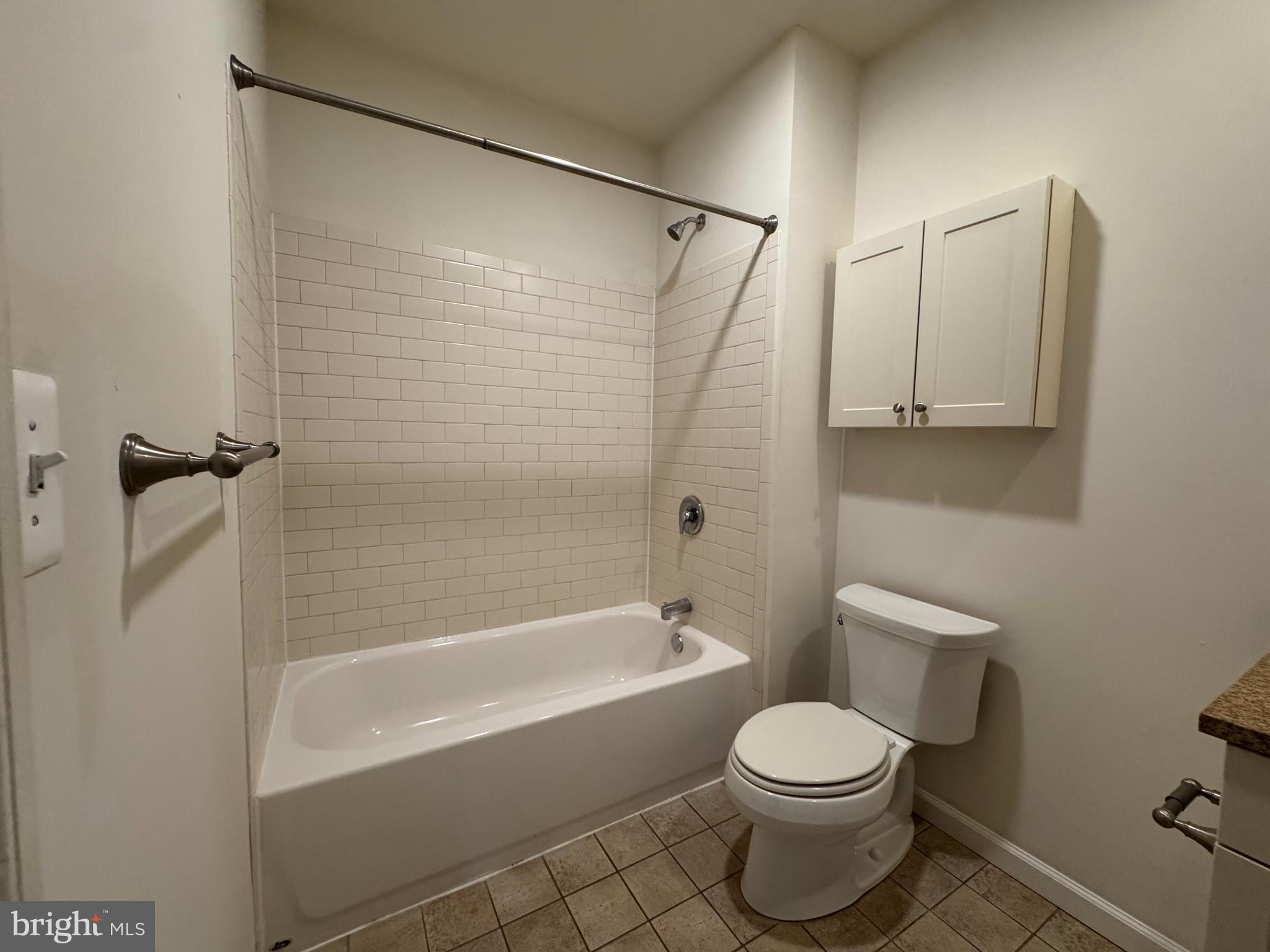 2040 Market Street, Unit 615 Philadelphia, PA 19103 - Photo 9 of 12 a bathroom with a toilet and a shower