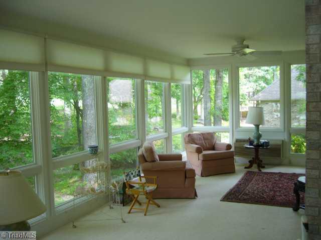 4500 Oakcliffe Road Greensboro, NC 27406 - Photo 3 of 11 Sunroom. Spend all your free time enjoying the sunroom!