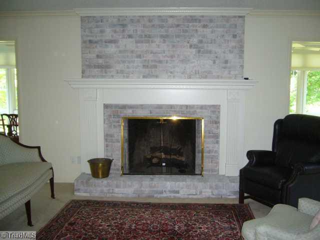 4500 Oakcliffe Road Greensboro, NC 27406 - Photo 5 of 11 Living Room. Lovely fireplace