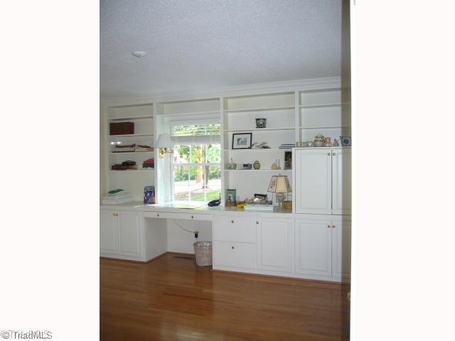 4500 Oakcliffe Road Greensboro, NC 27406 - Photo 7 of 11 Studio/Study/Office. Plenty of space for den and office use - recently held couch, area rug on hardwoods, TV and several occassional chairs - very comfortable! Had previously served as dining room.