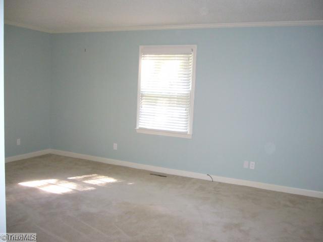 4500 Oakcliffe Road Greensboro, NC 27406 - Photo 8 of 11 Master Bedroom. Easily accommodates king-sized bed plus several large storage pieces!