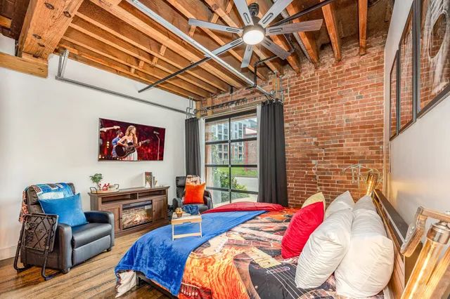 a bed room with furniture and a bed