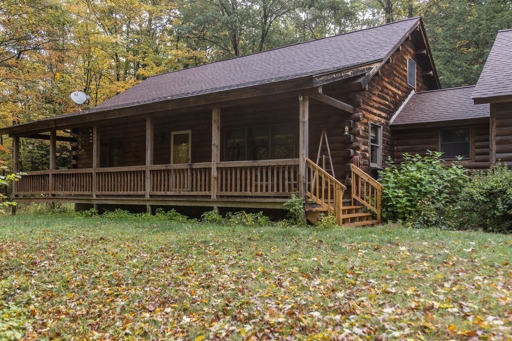 a view of backyard with green space