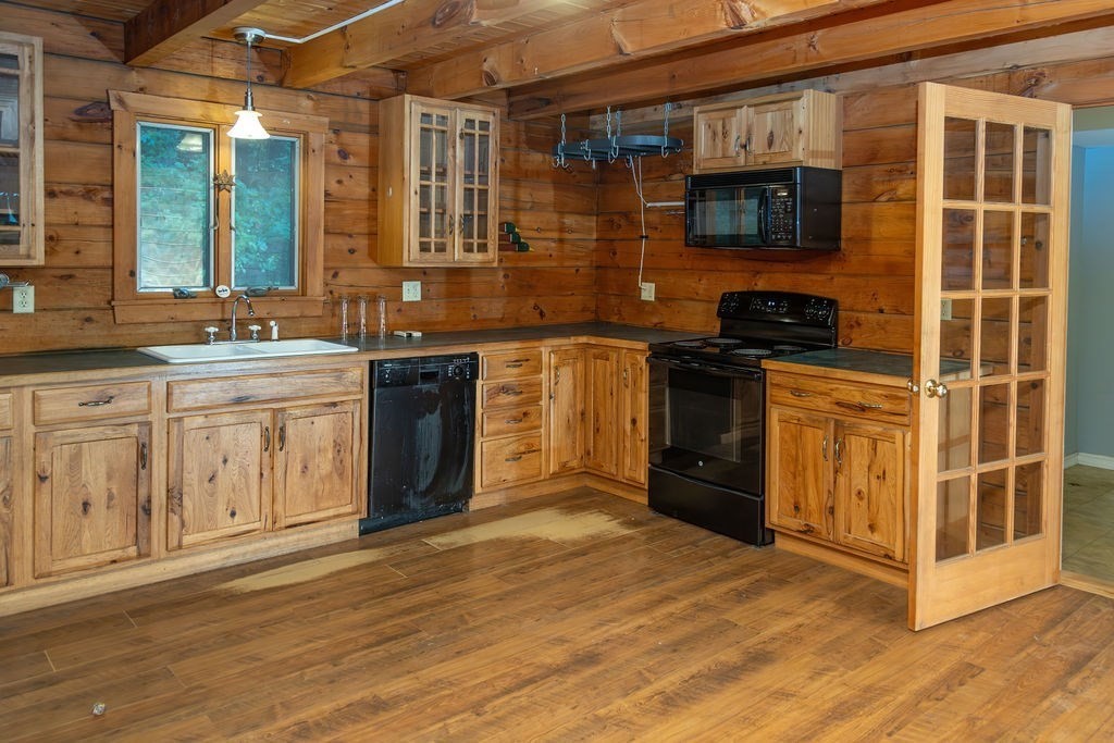 119 Long Plain Road Leverett, MA 01054 - Photo 12 of 38 a kitchen with stainless steel appliances granite countertop a stove and a sink