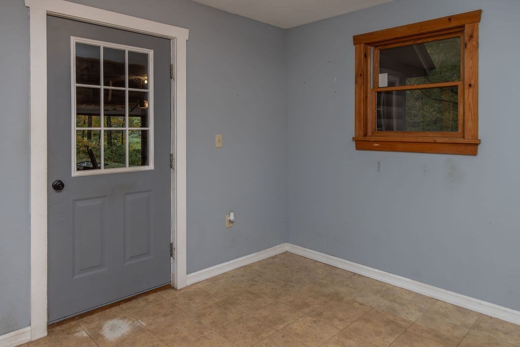 119 Long Plain Road Leverett, MA 01054 - Photo 13 of 38 an empty room with a window