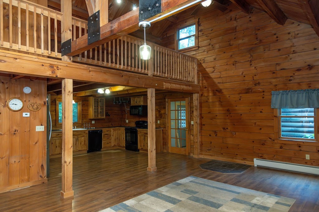 119 Long Plain Road Leverett, MA 01054 - Photo 17 of 38 a view of a living room with a wooden deck