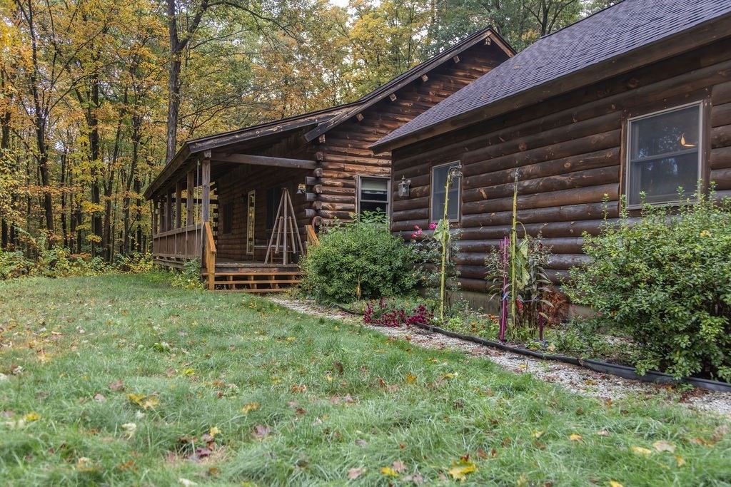 119 Long Plain Road Leverett, MA 01054 - Photo 2 of 38 a view of house with backyard and garden