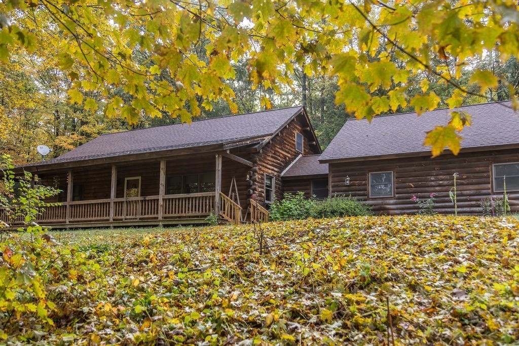 119 Long Plain Road Leverett, MA 01054 - Photo 4 of 38 a front view of a house with a garden