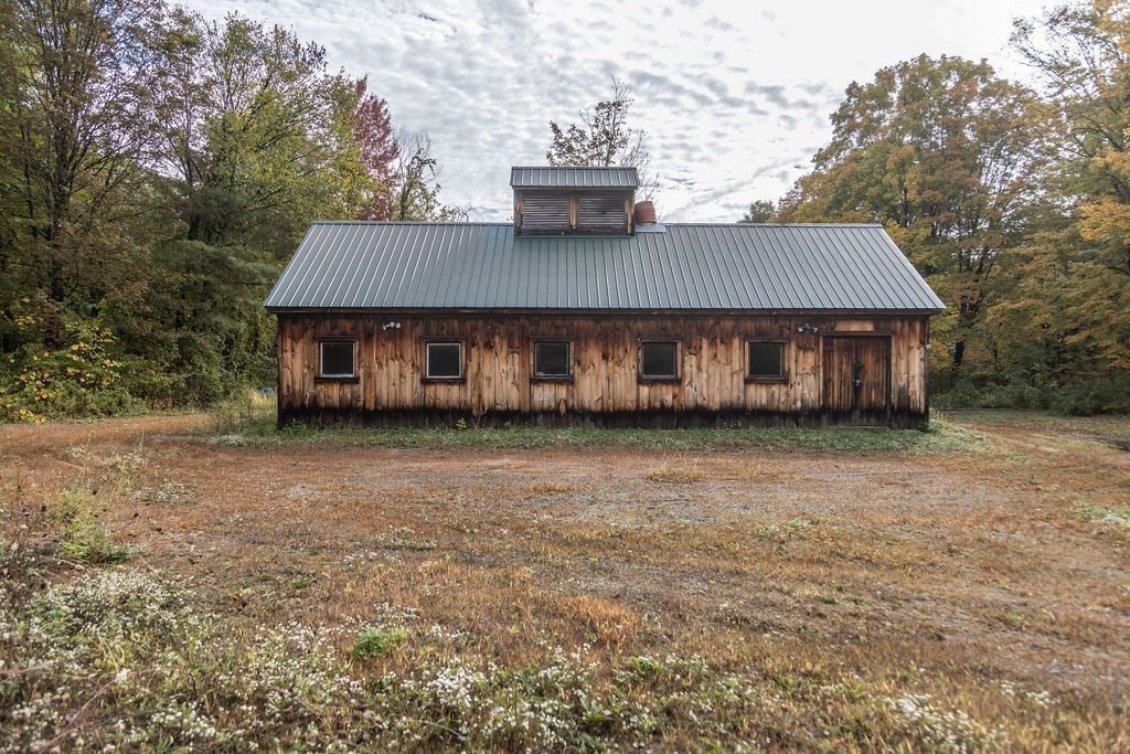 119 Long Plain Road Leverett, MA 01054 - Photo 8 of 38 a view of a house with a yard