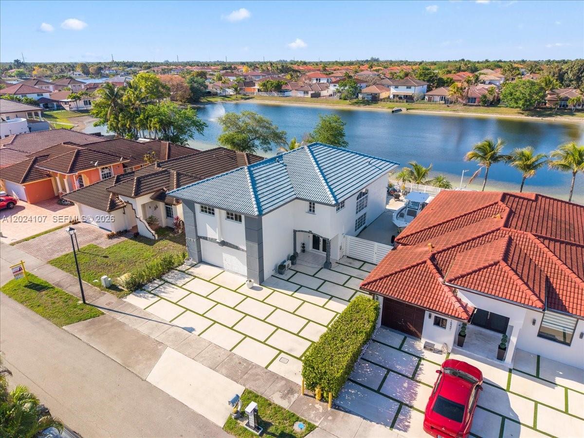 15341 Southwest 36th Street Miami, FL 33185 - Photo 2 of 56 an aerial view of a house with a terrace view