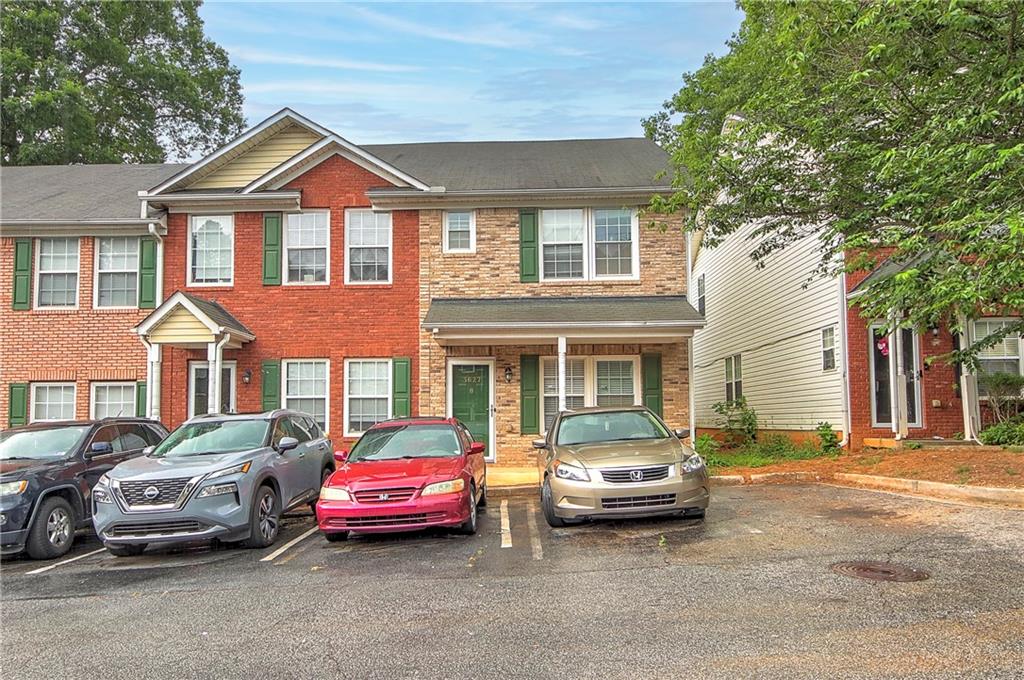 a car parked in front of a house