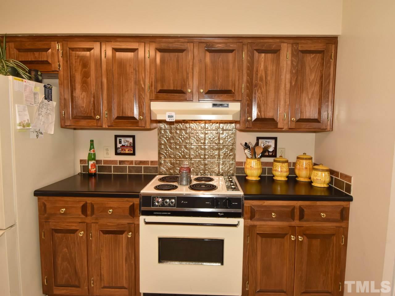 350 Sullivan Road Selma, NC 27576 - Photo 11 of 25 Tons of real wood Kitchen cabinets made in local cabinet shop.