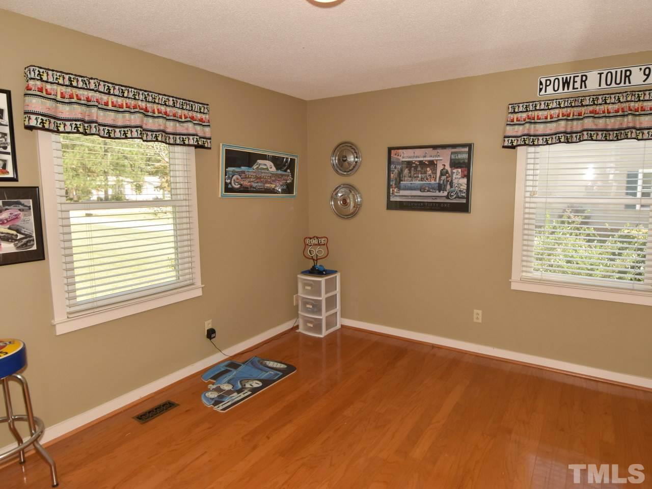 350 Sullivan Road Selma, NC 27576 - Photo 16 of 25 Easy care flooring in bedroom.