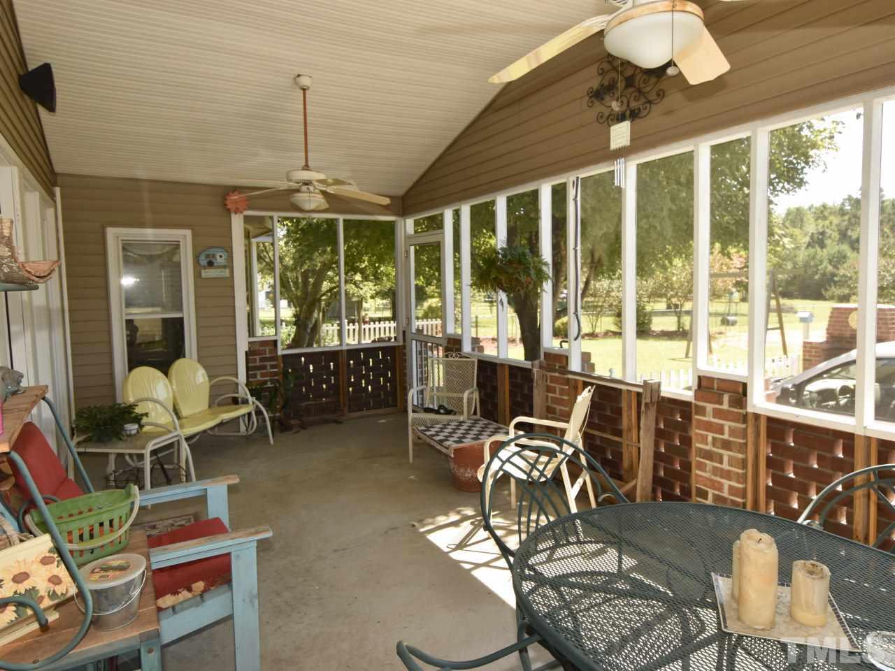 350 Sullivan Road Selma, NC 27576 - Photo 21 of 25 Must see fabulous screen porch ~room for activities and entertaining.