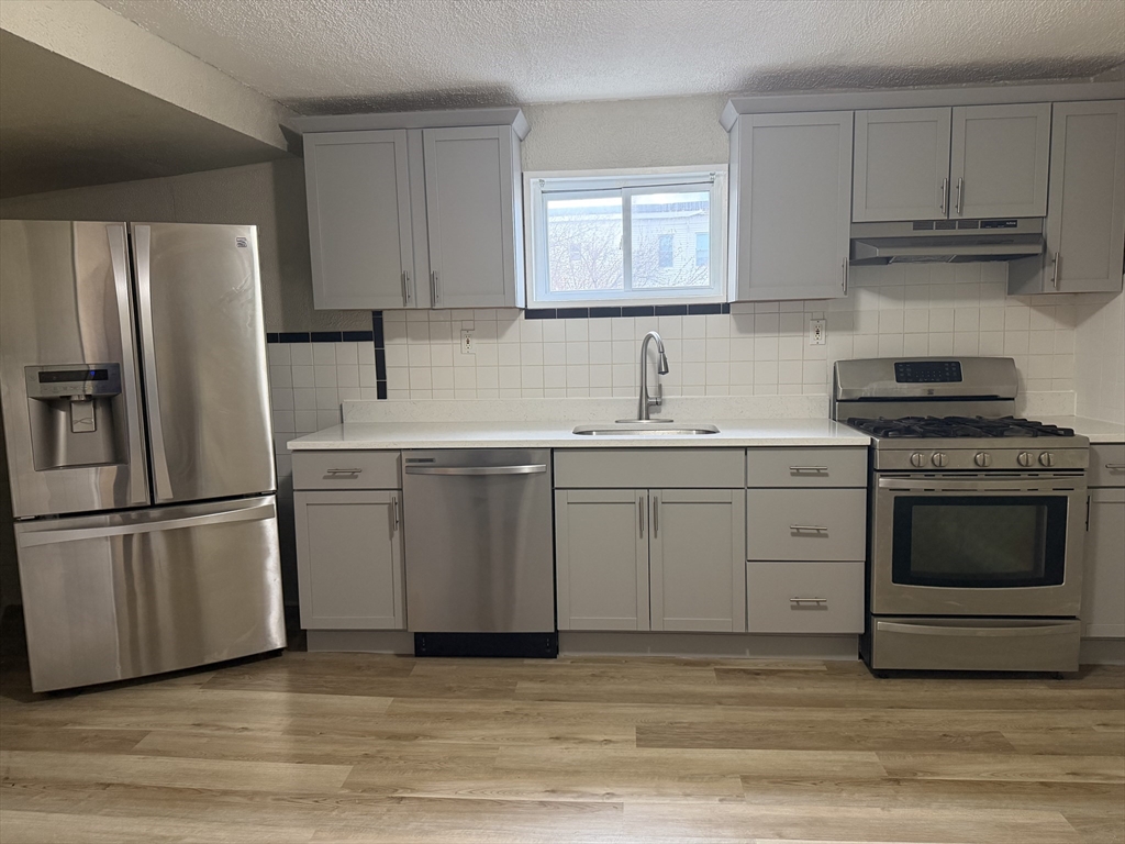 48 Wamesit Street, Unit 2 Lowell, MA 01852 - Photo 2 of 14