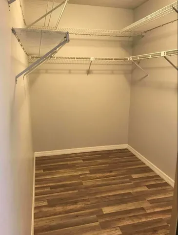 a view of a room with racks on the wall