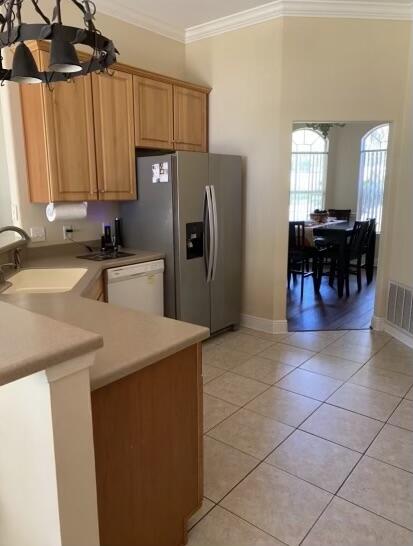10 Maple Avenue Shalimar, FL 32579 - Photo 13 of 21 a kitchen with a sink cabinets and refrigerator