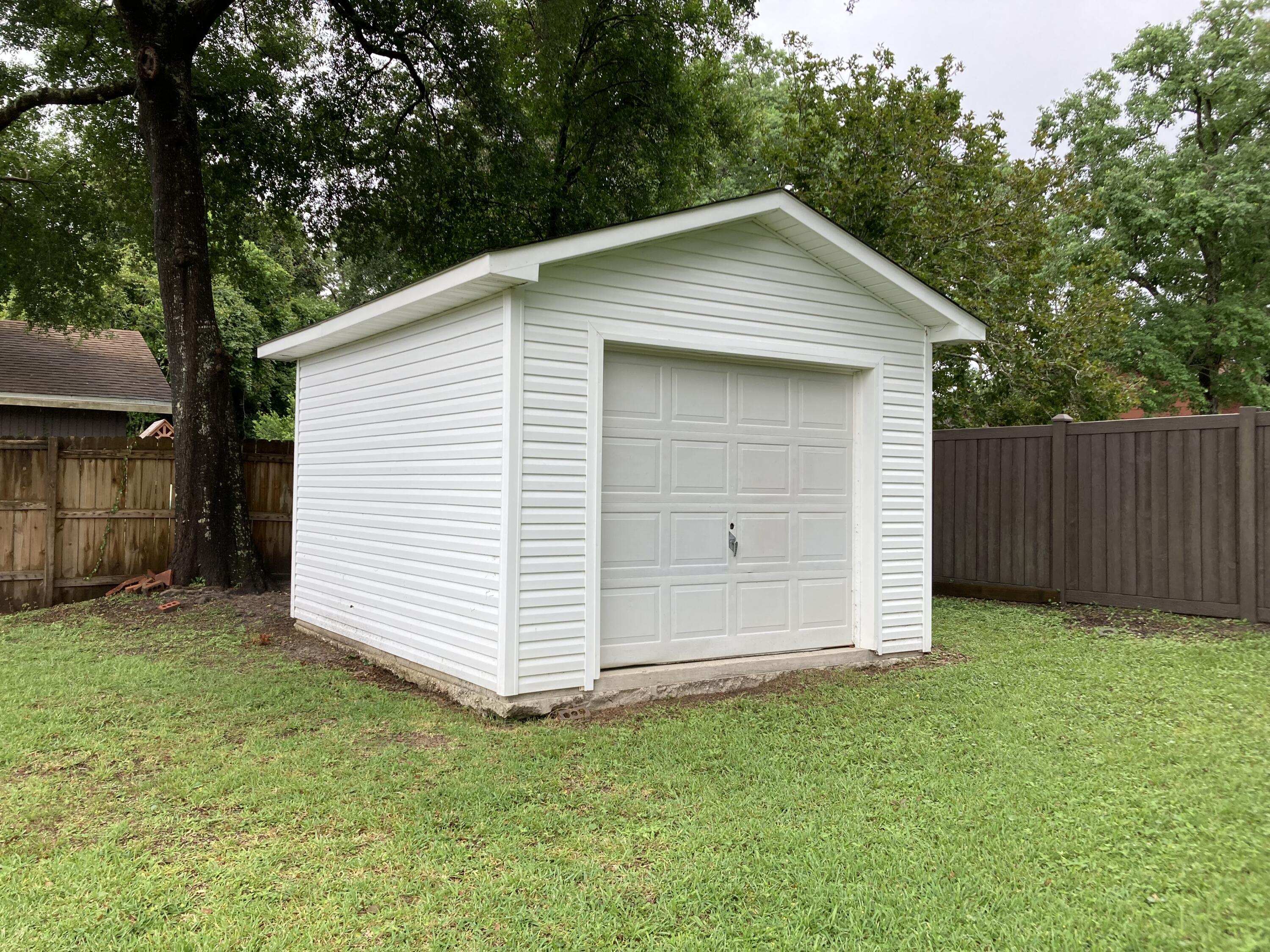 10 Maple Avenue Shalimar, FL 32579 - Photo 20 of 21 a view of a small house with a yard