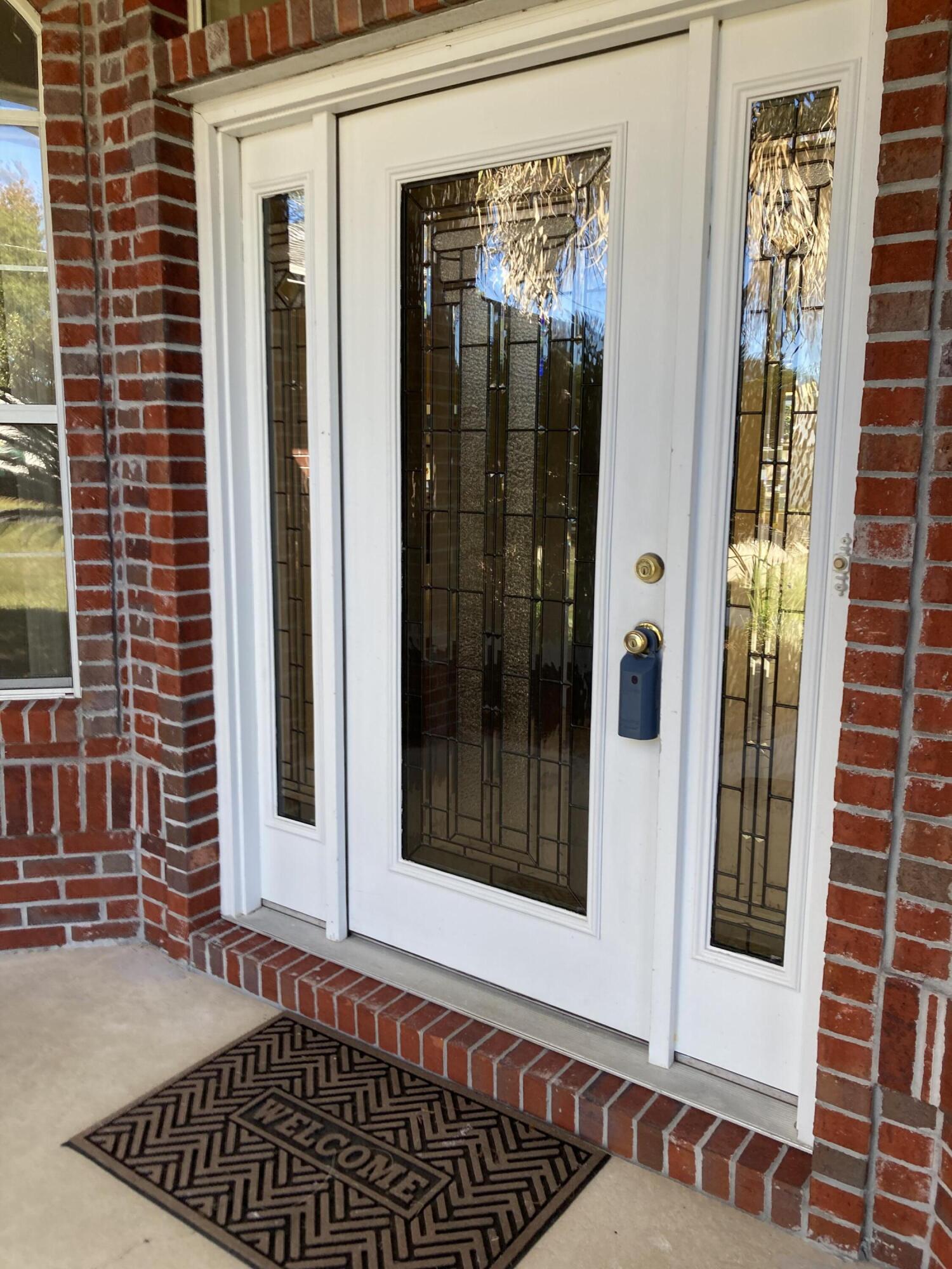 10 Maple Avenue Shalimar, FL 32579 - Photo 2 of 21 a view of a door with a glass door