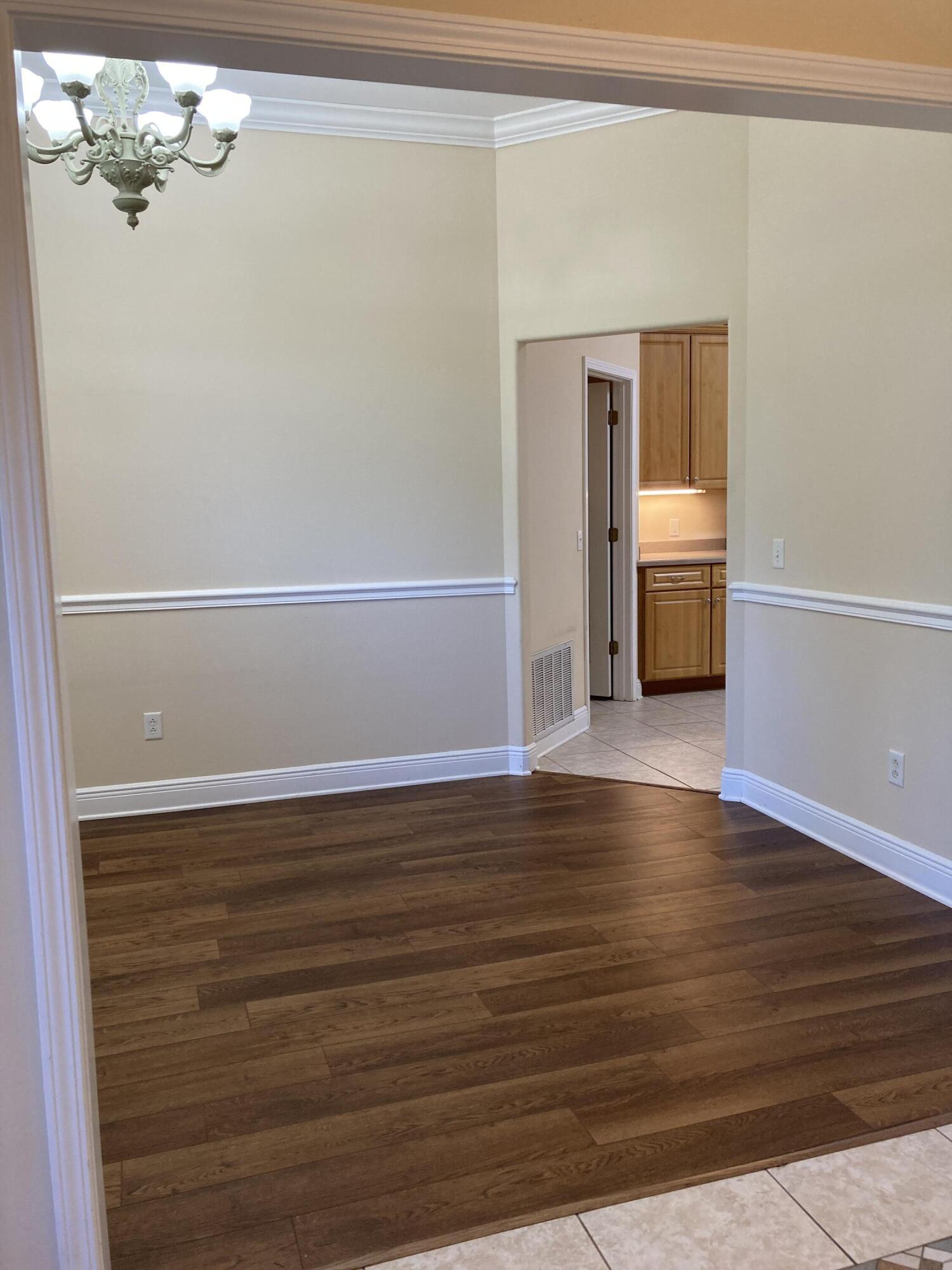 10 Maple Avenue Shalimar, FL 32579 - Photo 5 of 21 a view of a livingroom with wooden floor