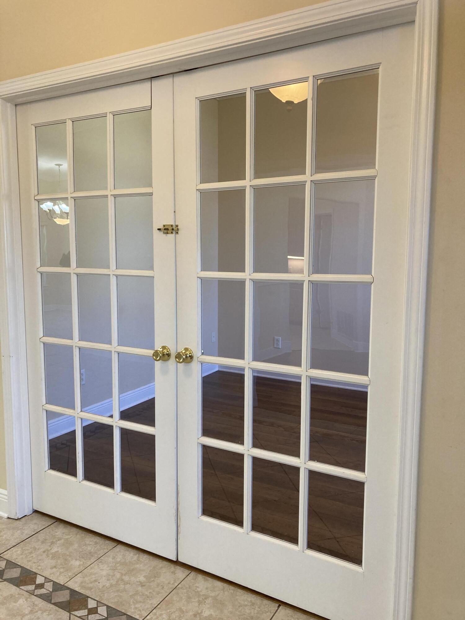 10 Maple Avenue Shalimar, FL 32579 - Photo 7 of 21 a view of an empty room with wooden floor and closet