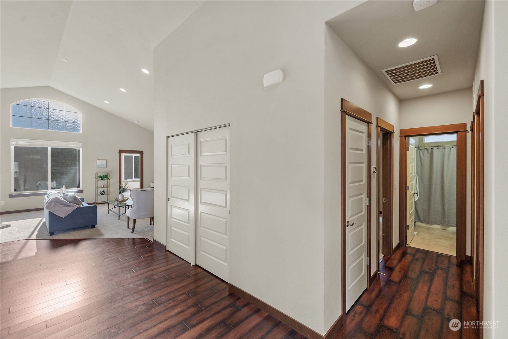 23012 Barker Road Bothell, WA 98021 - Photo 3 of 30 a view of a hallway with wooden floor and furniture