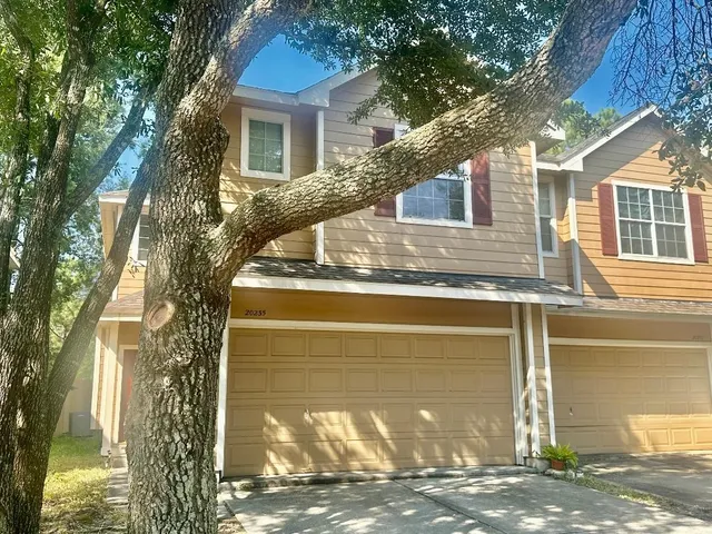 a house view with a outdoor space