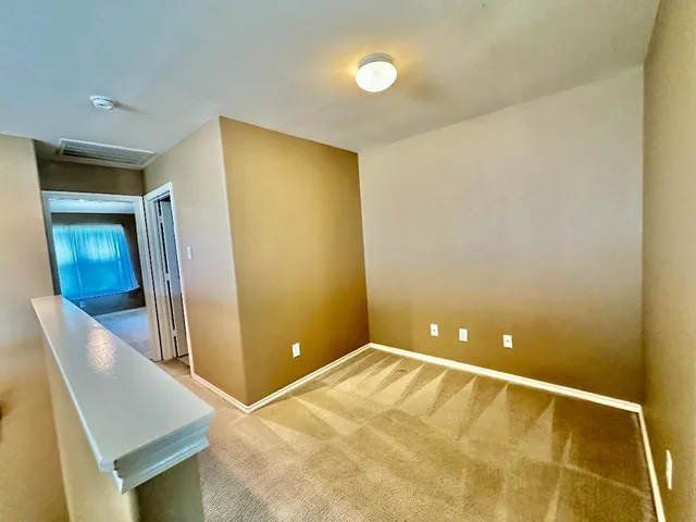 a view of livingroom with kitchen