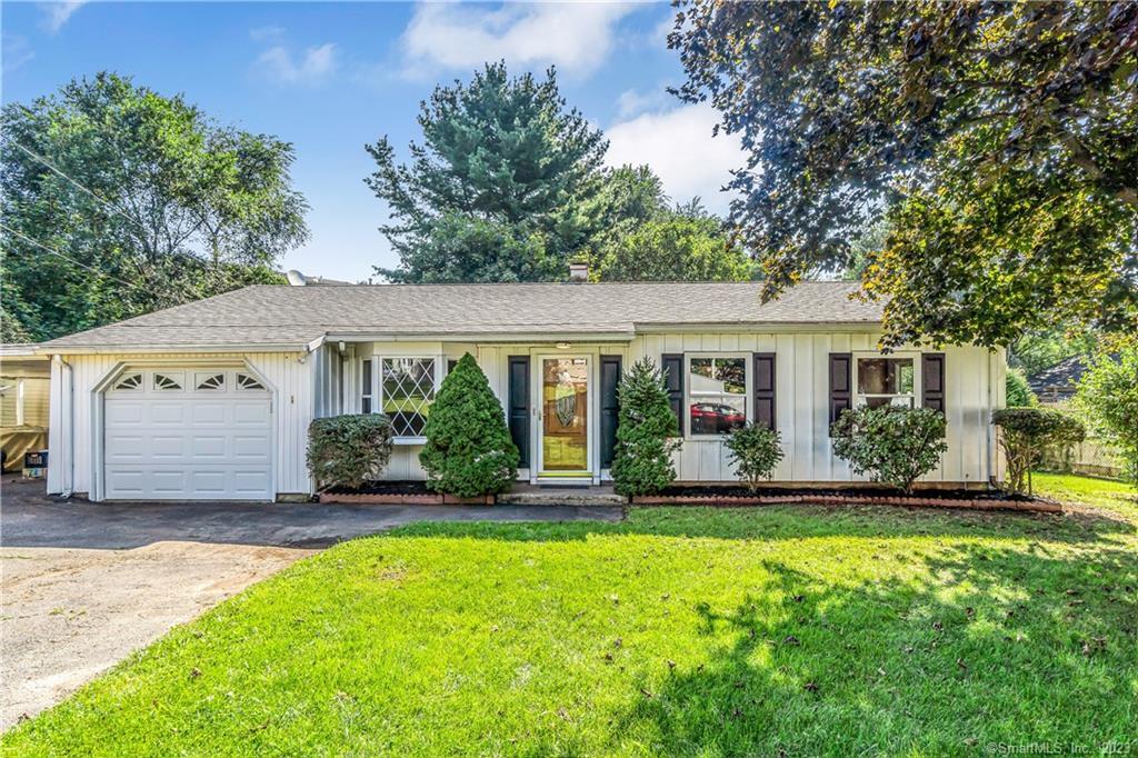 24 Sunburst Road Bridgeport, CT 06606 - Photo 1 of 1 front view of a house with a yard
