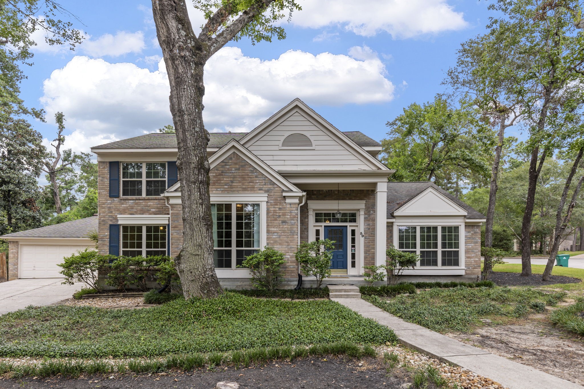 59 Fire Flicker Place Spring, TX 77381 - Photo 34 of 37 Discover this charming two-story brick home, in the heart of The Woodlands. Make your appointment now!