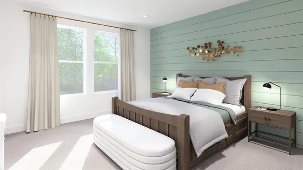 a bedroom with a bed and a painting on the wall