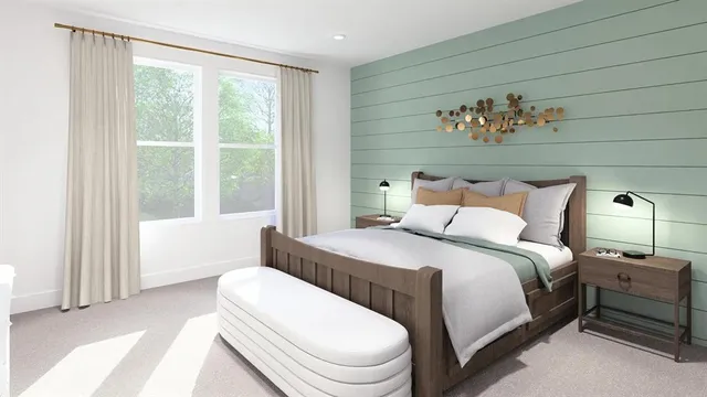 a bedroom with a bed and a painting on the wall