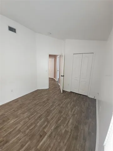 a bathroom with a sink a toilet a shower a vanity and a mirror