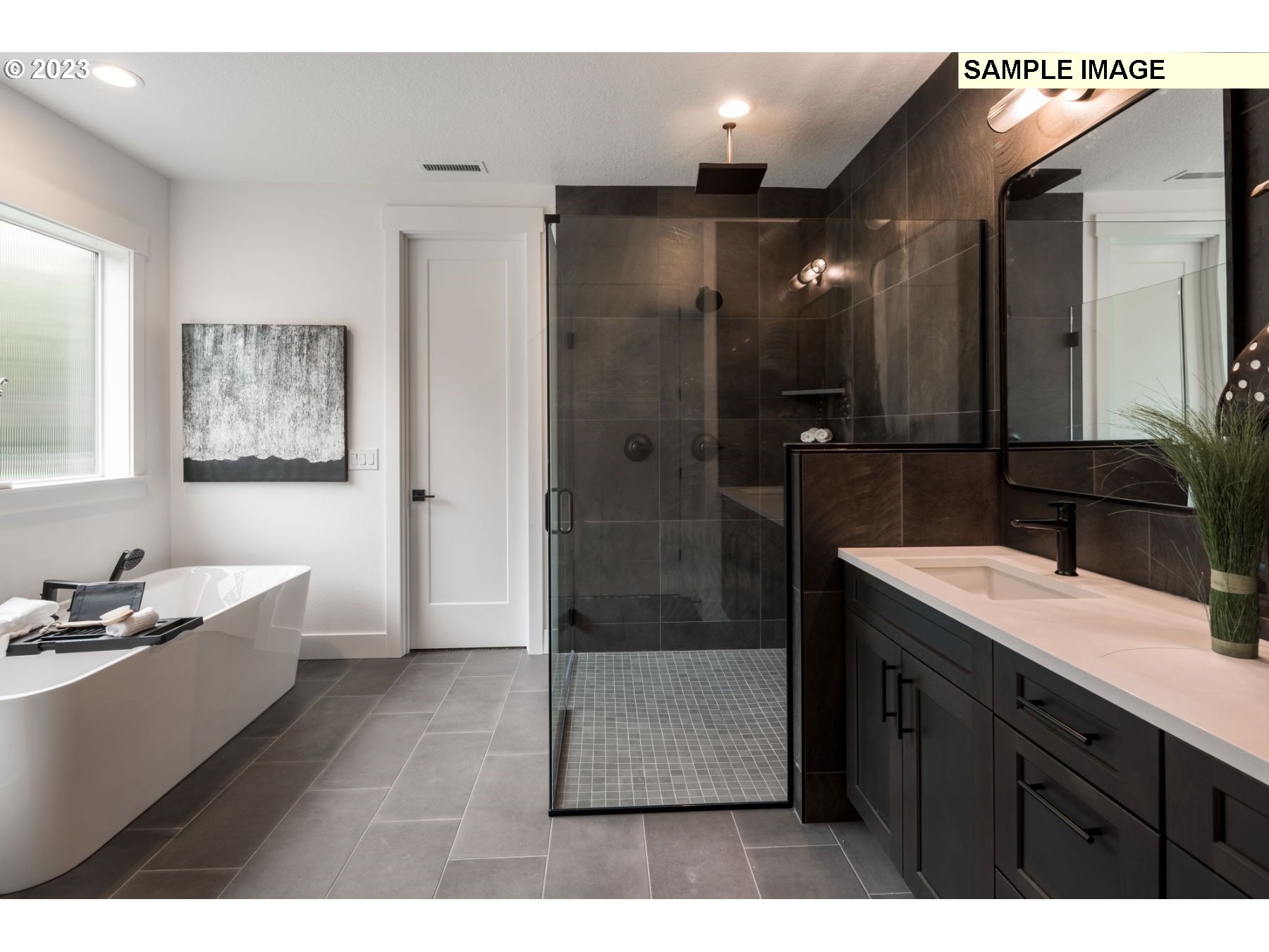 1208 South 48th Place Ridgefield, WA 98642 - Photo 15 of 21 a bathroom with a double vanity sink mirror and shower