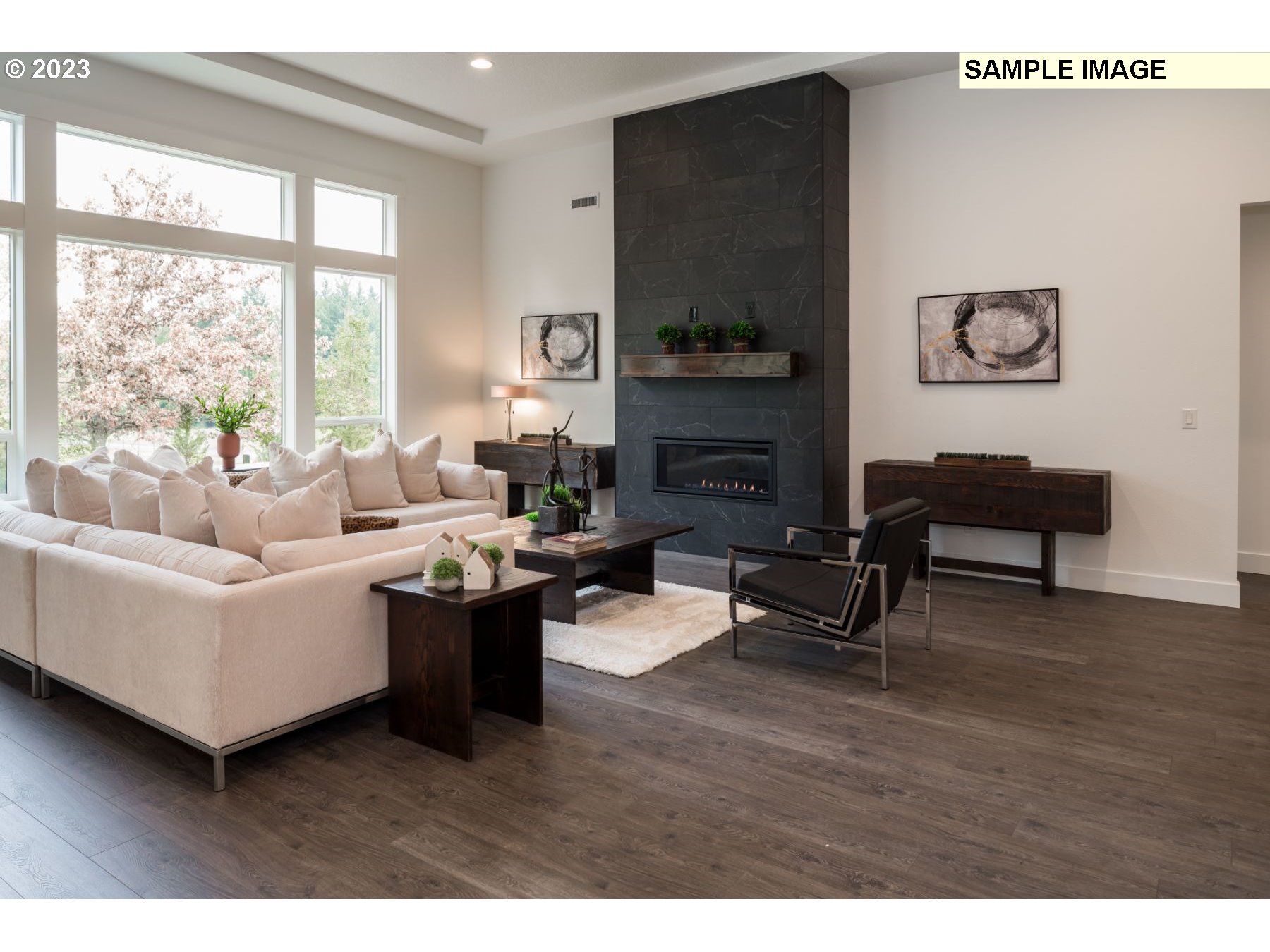 1208 South 48th Place Ridgefield, WA 98642 - Photo 7 of 21 a living room with furniture and a fireplace