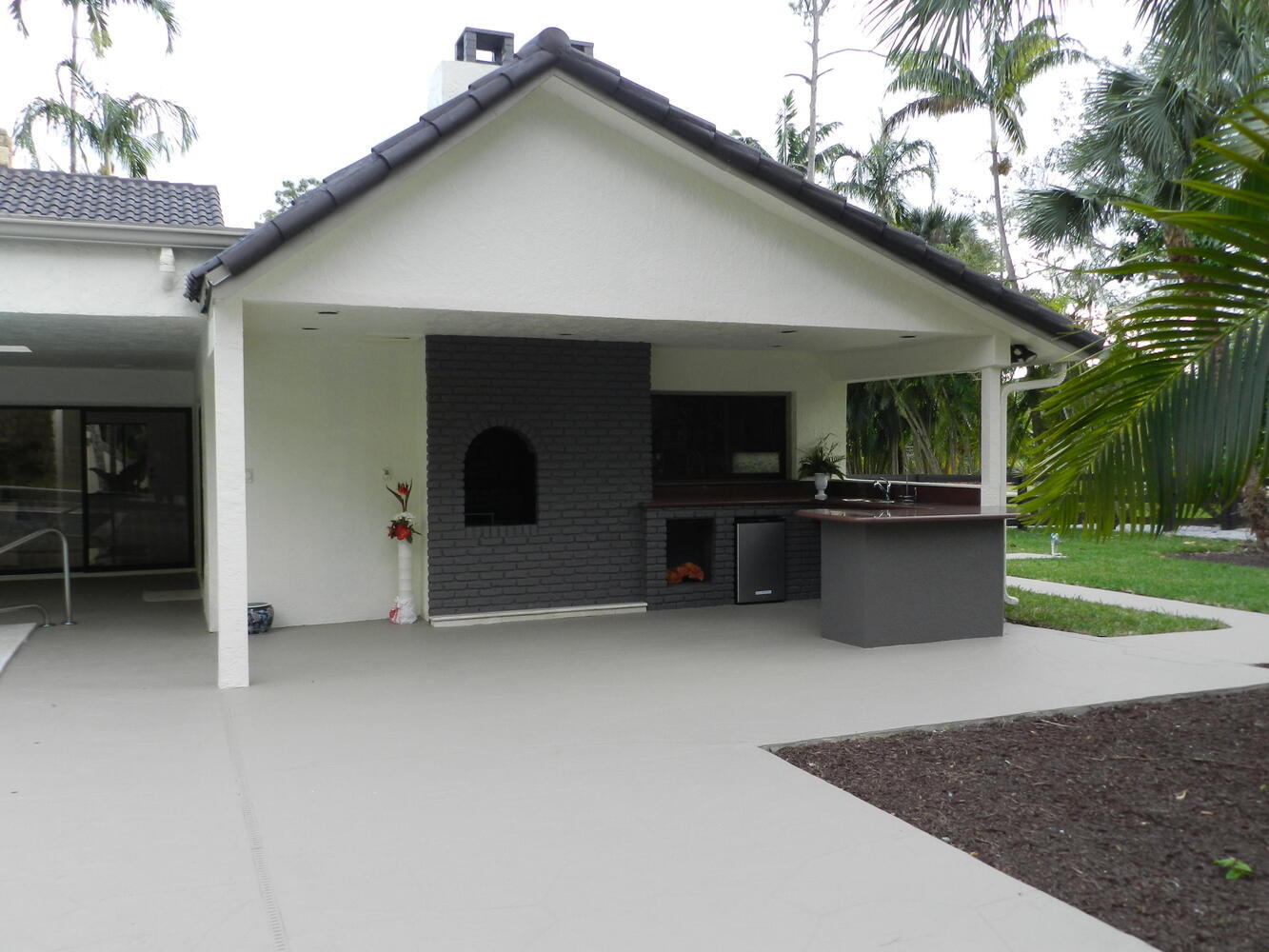 12677 Pineacre Lane Wellington, FL 33414 - Photo 14 of 38 a view of an house with backyard and kitchen