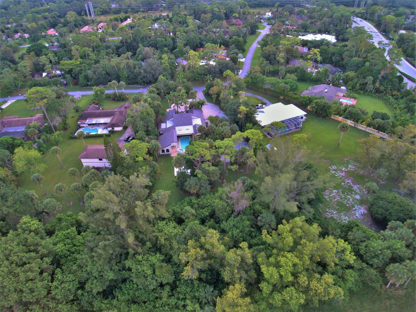 12677 Pineacre Lane Wellington, FL 33414 - Photo 27 of 38 a close up of a city
