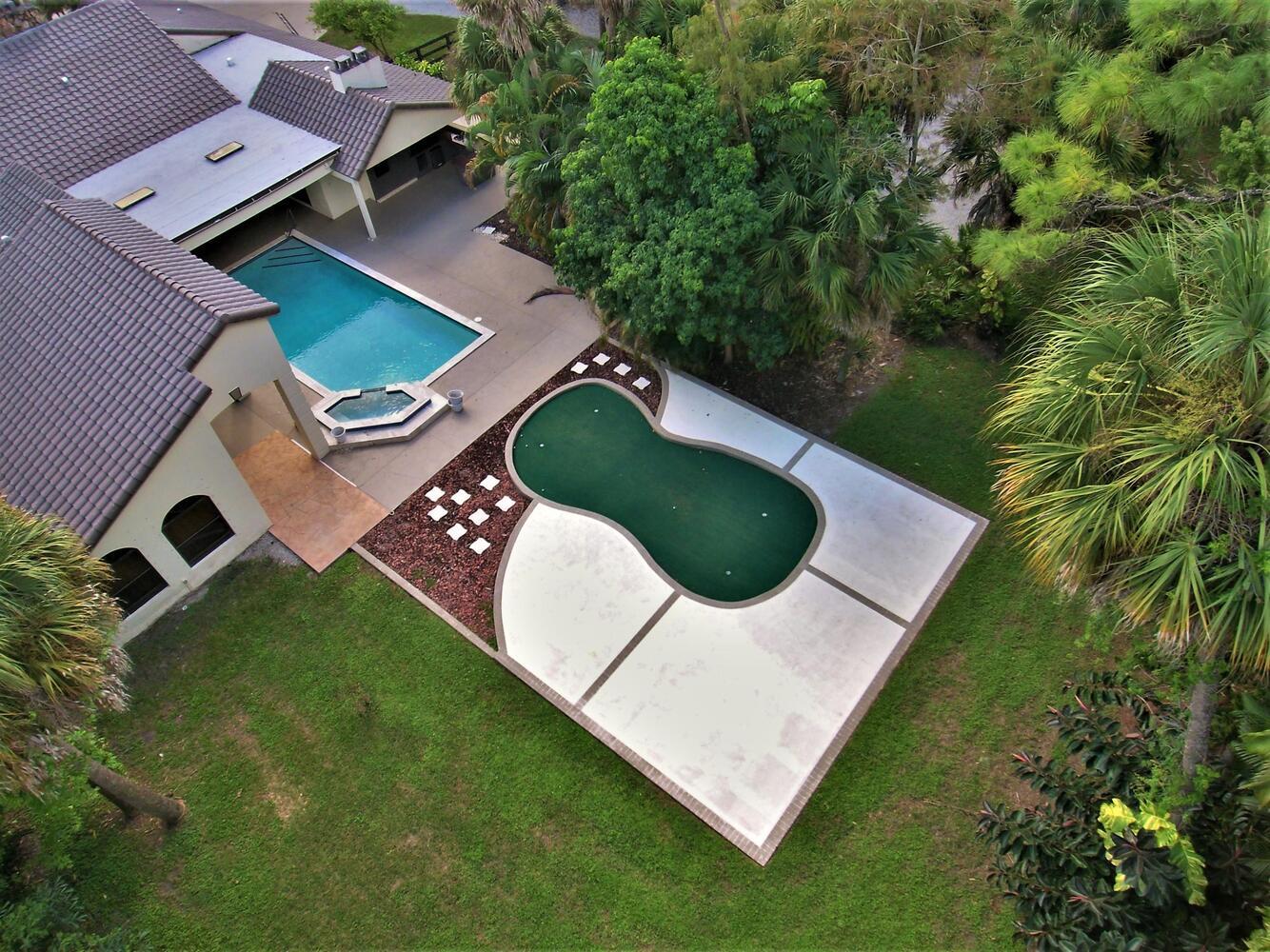 12677 Pineacre Lane Wellington, FL 33414 - Photo 30 of 38 an aerial view of a house