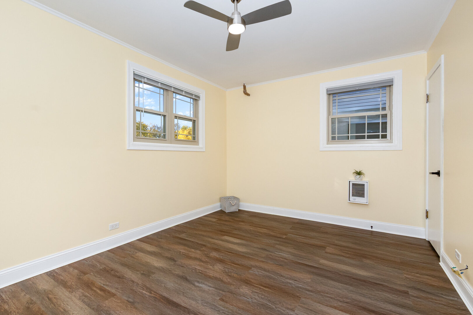 2514 Spruce Road Homewood, IL 60430 - Photo 9 of 18 a view of an empty room with wooden floor and a window