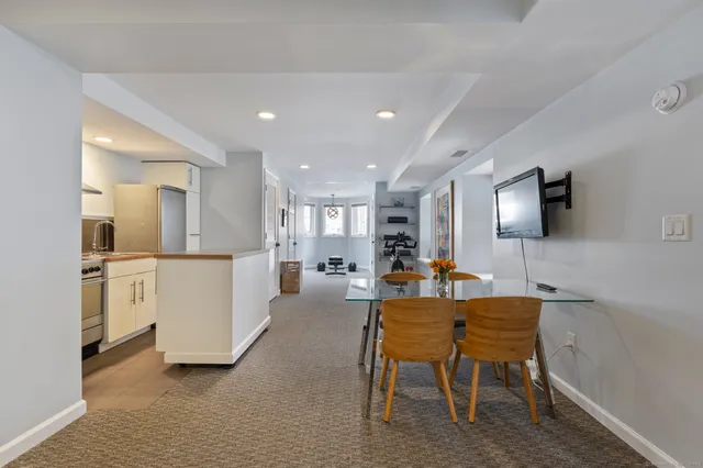 a view of a dining room with furniture