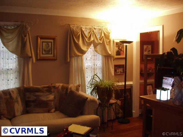 7701 Turner Road Richmond, VA 23231 - Photo 3 of 9 Other - Formal living room with crown moldings
