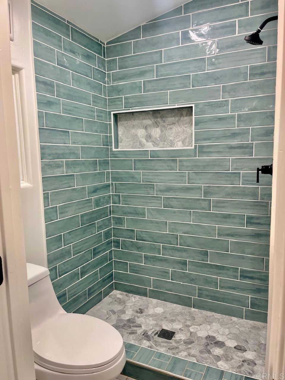 9902 Jamacha Boulevard, Unit 160 Spring Valley, CA 91977 - Photo 12 of 18 a bathroom with a toilet and a shower