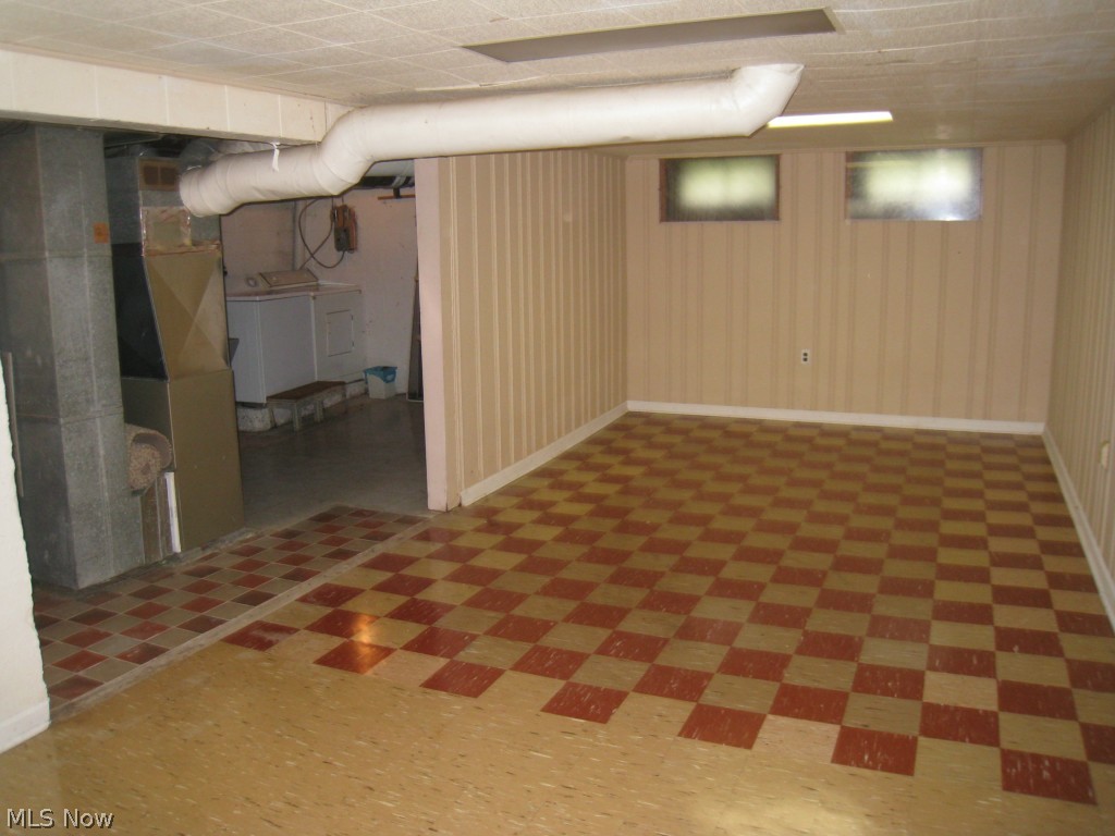 4674 Liberty Road South Euclid, OH 44121 - Photo 16 of 18 2nd View of the Recreation room and laundry area. There is also a workshop in the basement.