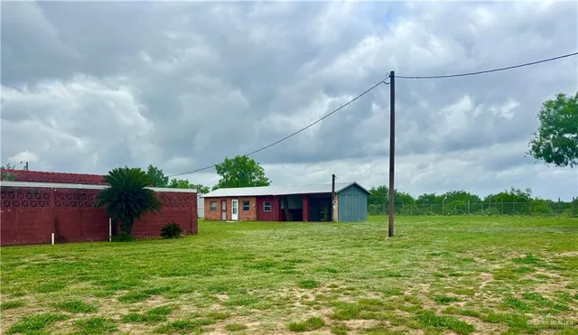 a house view with a garden space