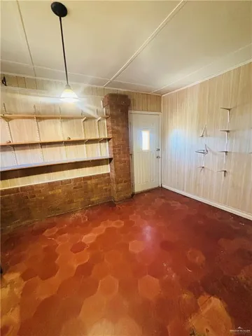 a view of a room with an empty space